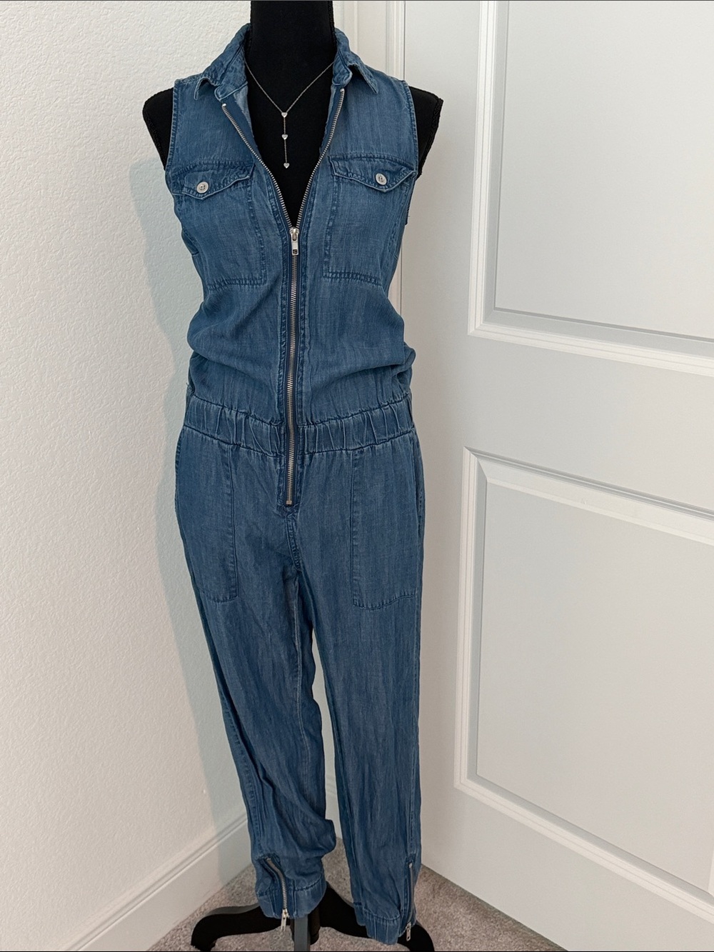 Sleeveless Blue Denim Jumpsuit with Zipper Front. Gabrielle Union collection